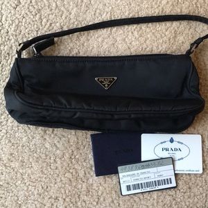 Prada, black nylon pouchette with authenticity